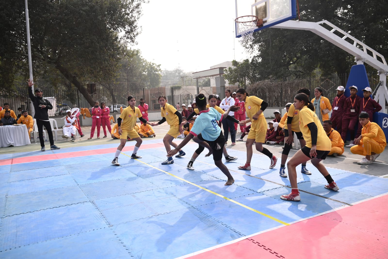 Girls kabaddi raid on the mat