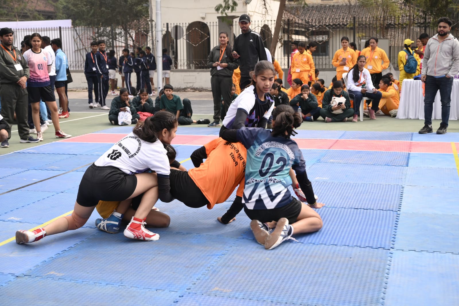 Under-19 girls tackle during a match